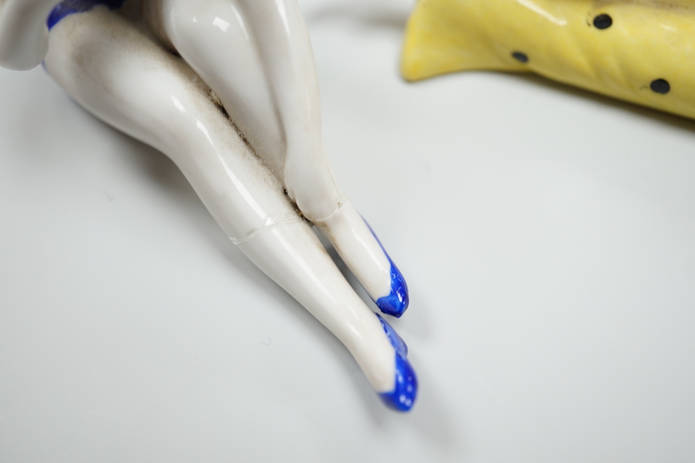 Two German Art Deco porcelain models of bathing beauties, longest 14.5cm
